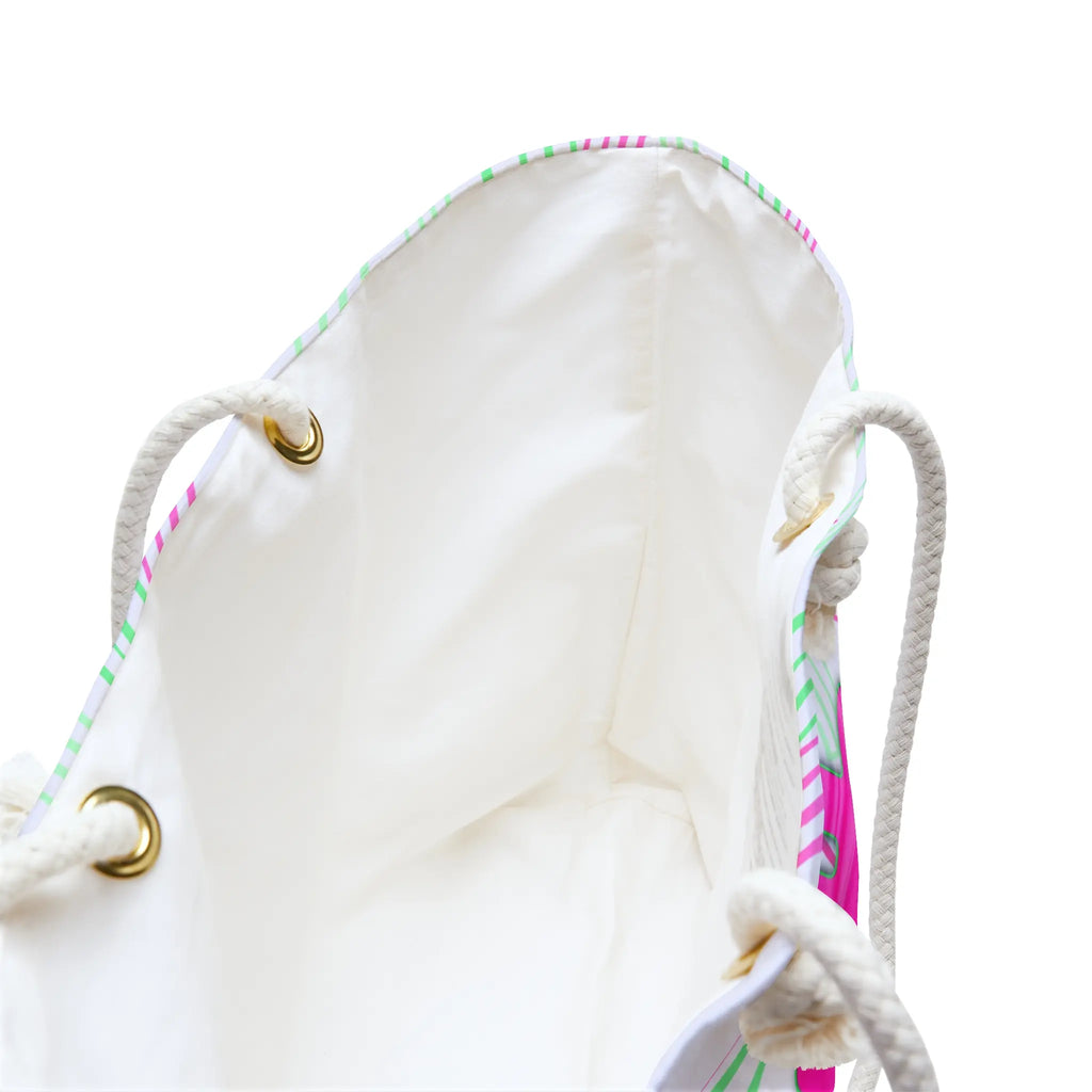 Interior view of the Bitcoin Belle Pink Passion bag highlighting the spacious cream-colored lining and durable gold-toned grommets.