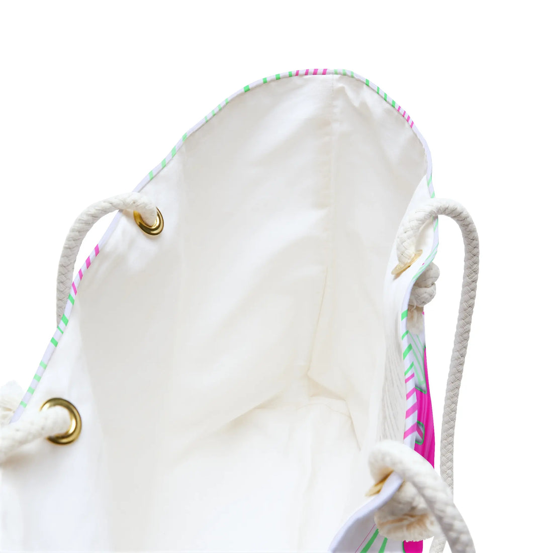 Interior view of the Bitcoin Belle Pink Passion bag highlighting the spacious cream-colored lining and durable gold-toned grommets.