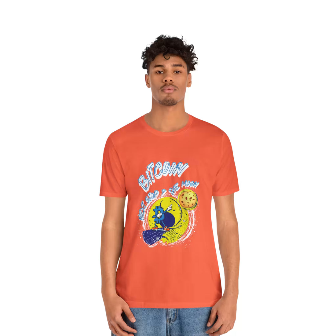 Front view of a model in the coral Bitcoin Next Stop The Moon t-shirt, embracing hyperbitcoinization.