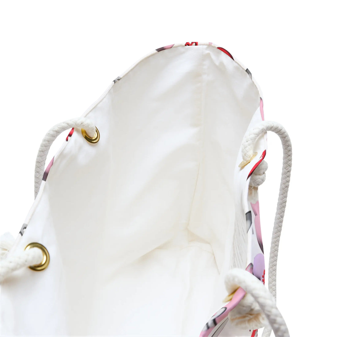 Interior of the 24 x 13 inch Bitcoin SweetHearts bag revealing a spacious cream lining, internal pockets, and durable gold-toned grommets.