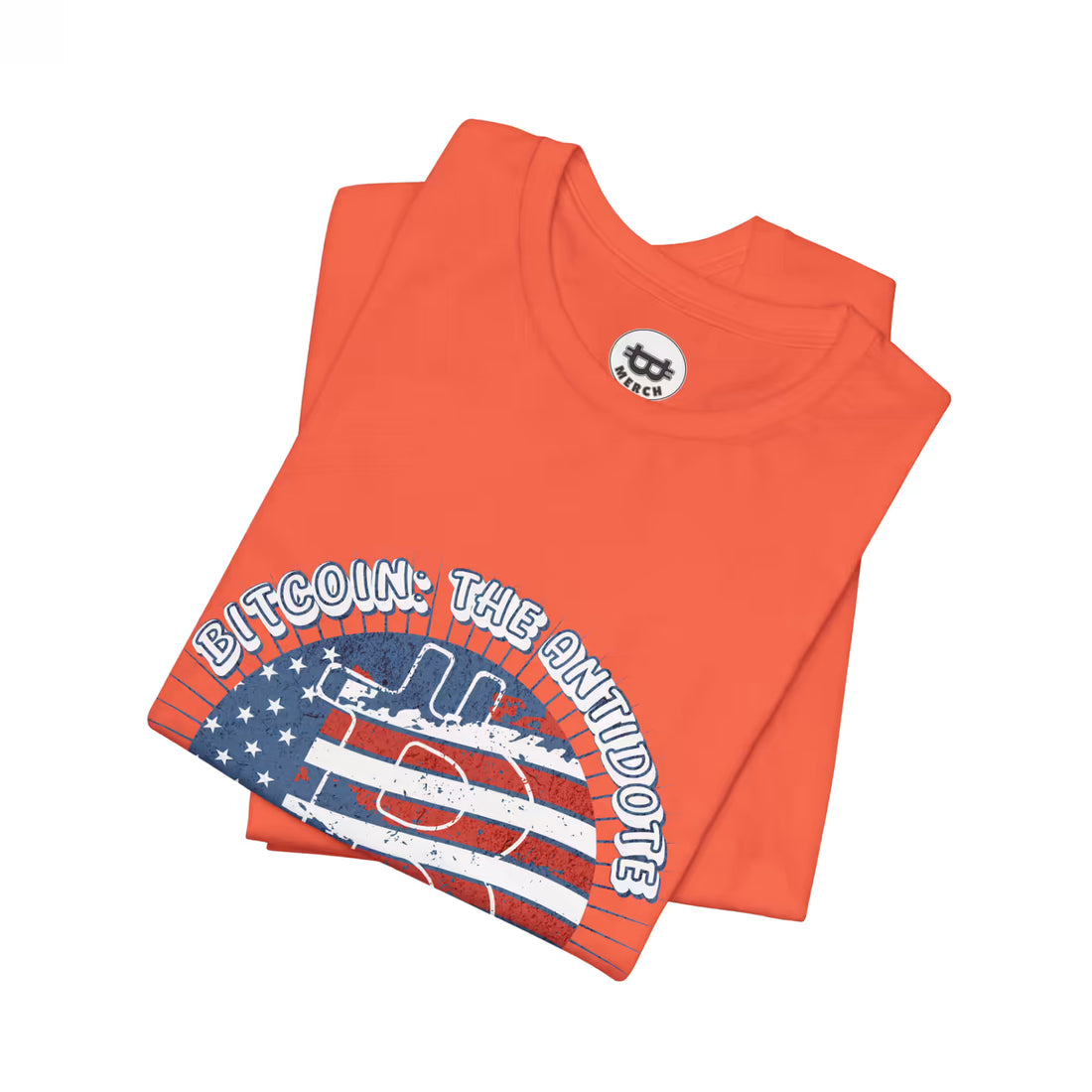 Folded view of the coral Bitcoin The Antidote to Inflation t-shirt, showing the soft Bella Canvas 3001 fabric.