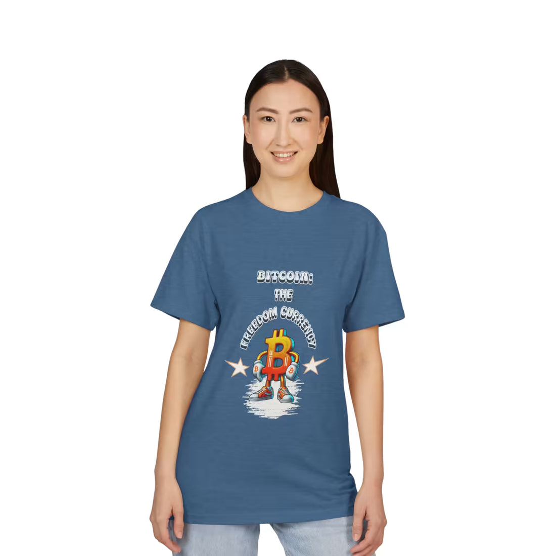 Front view of a model in the heather cool blue Bitcoin The Freedom Currency t-shirt, opting out of the fiat system.