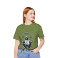 Front view of a model in the heather green Satoshi Nakamoto Genesis Block t-shirt, embracing decentralized money.